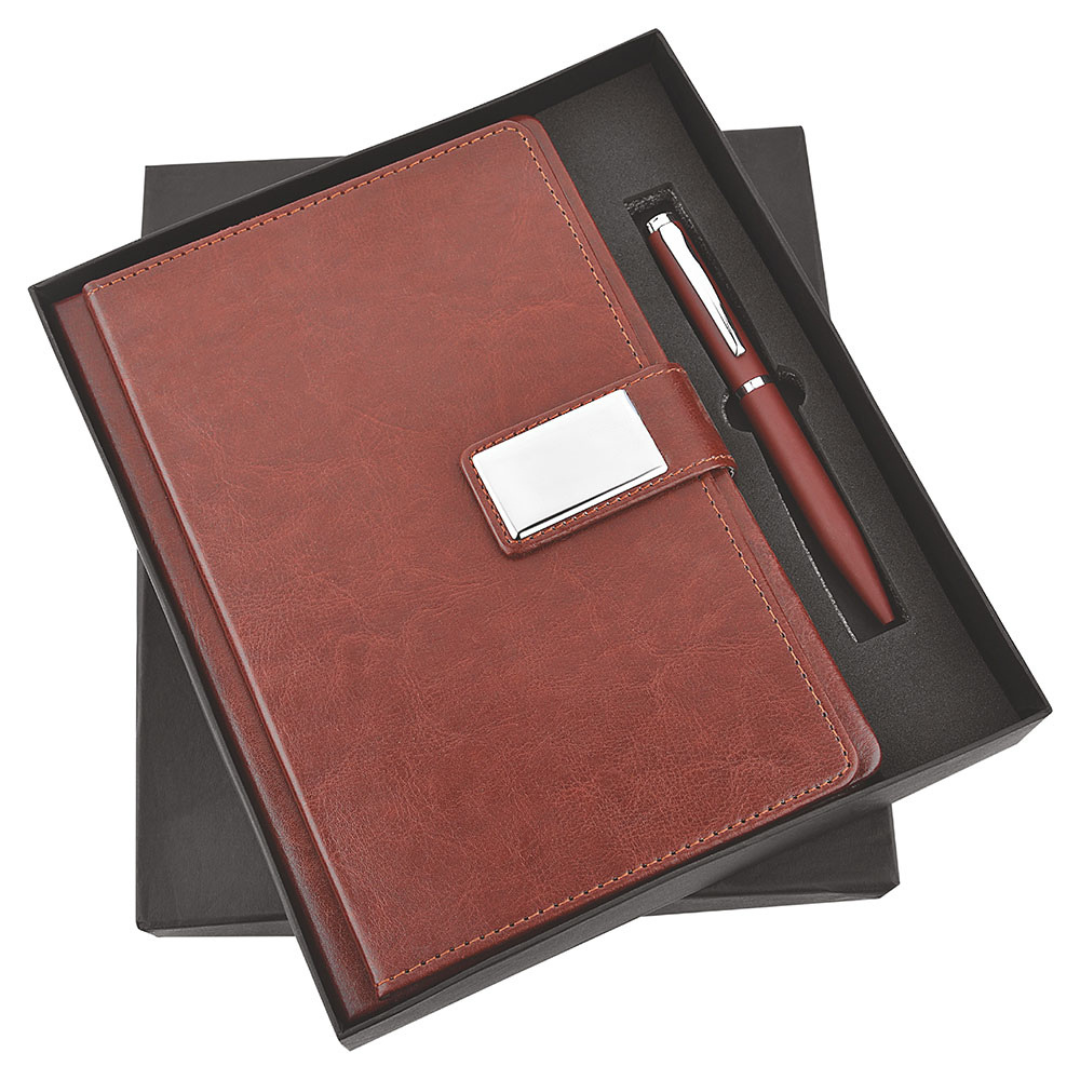 Brown leather notebook and pen in a gift box.
